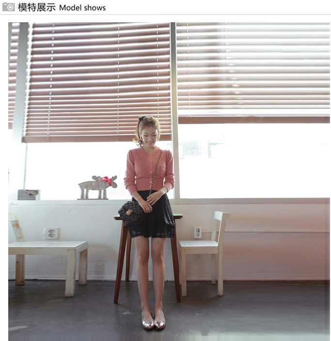 2011秋季热销韩版圆领镂花<em>短款长袖针织衫</em>修