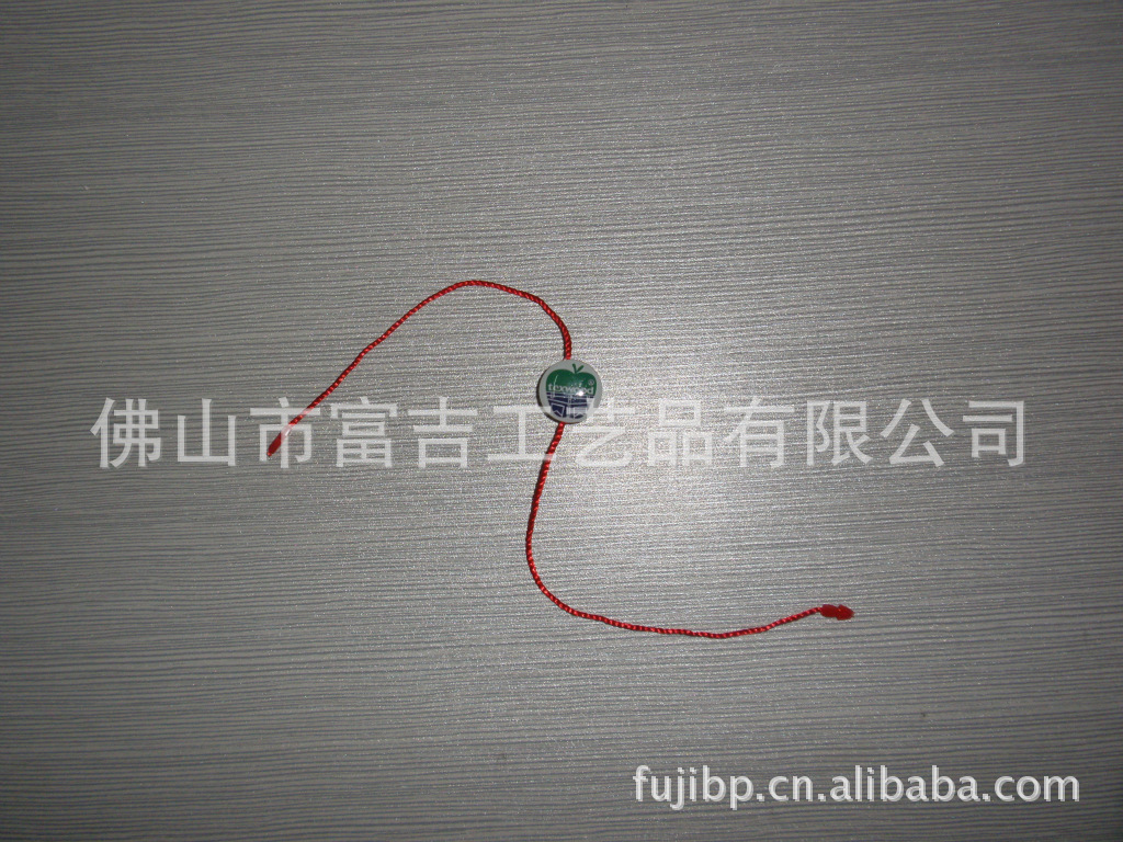 【吊粒水晶滴胶,水晶滴胶】吊粒塑料滴胶,塑料织唛吊牌图片