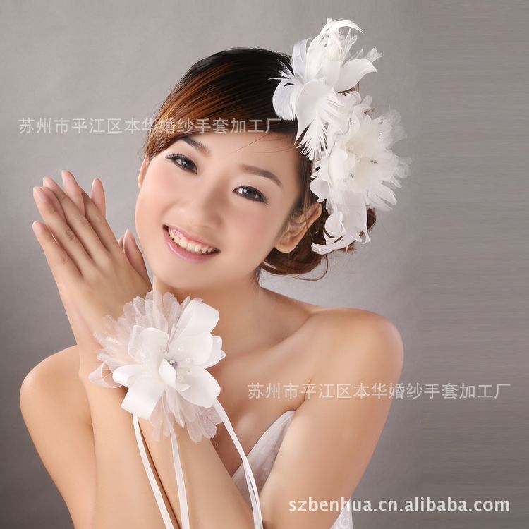 <em>新娘</em>头饰结婚头花发饰白色羽毛水钻花帽韩式婚