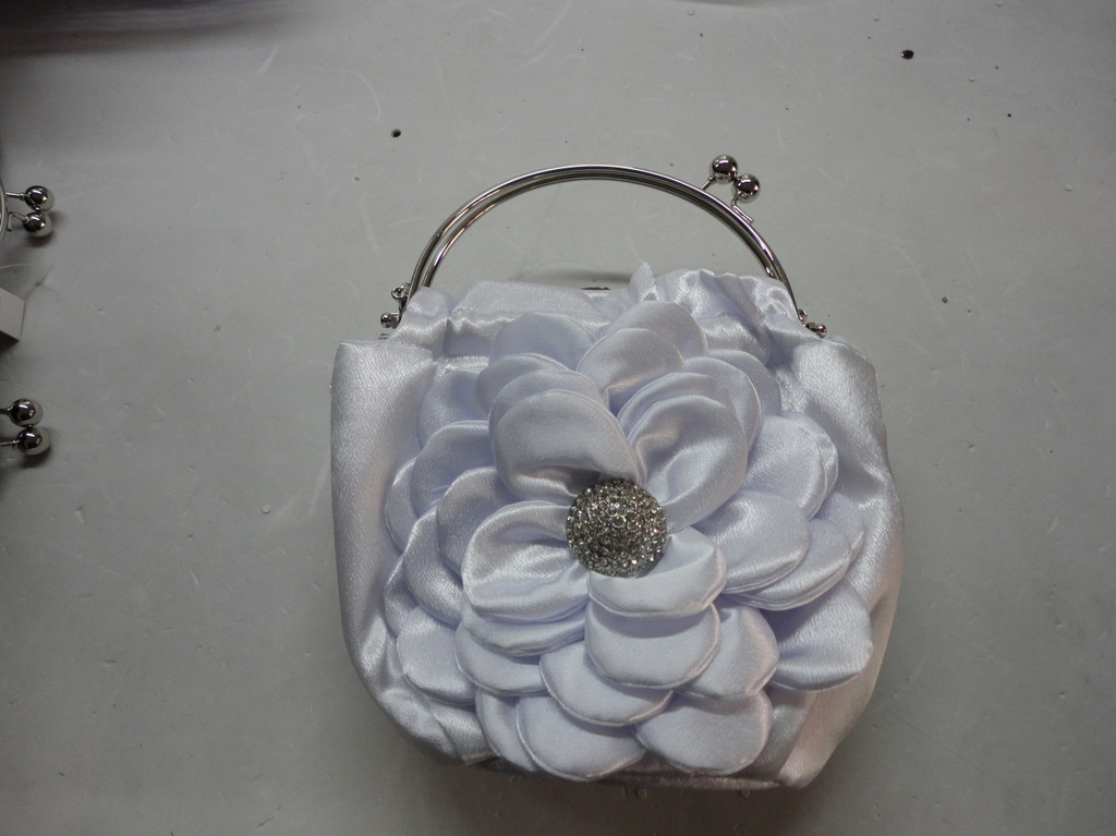 2012新款女士手拿包 时尚钻石太阳花斜扣手拿