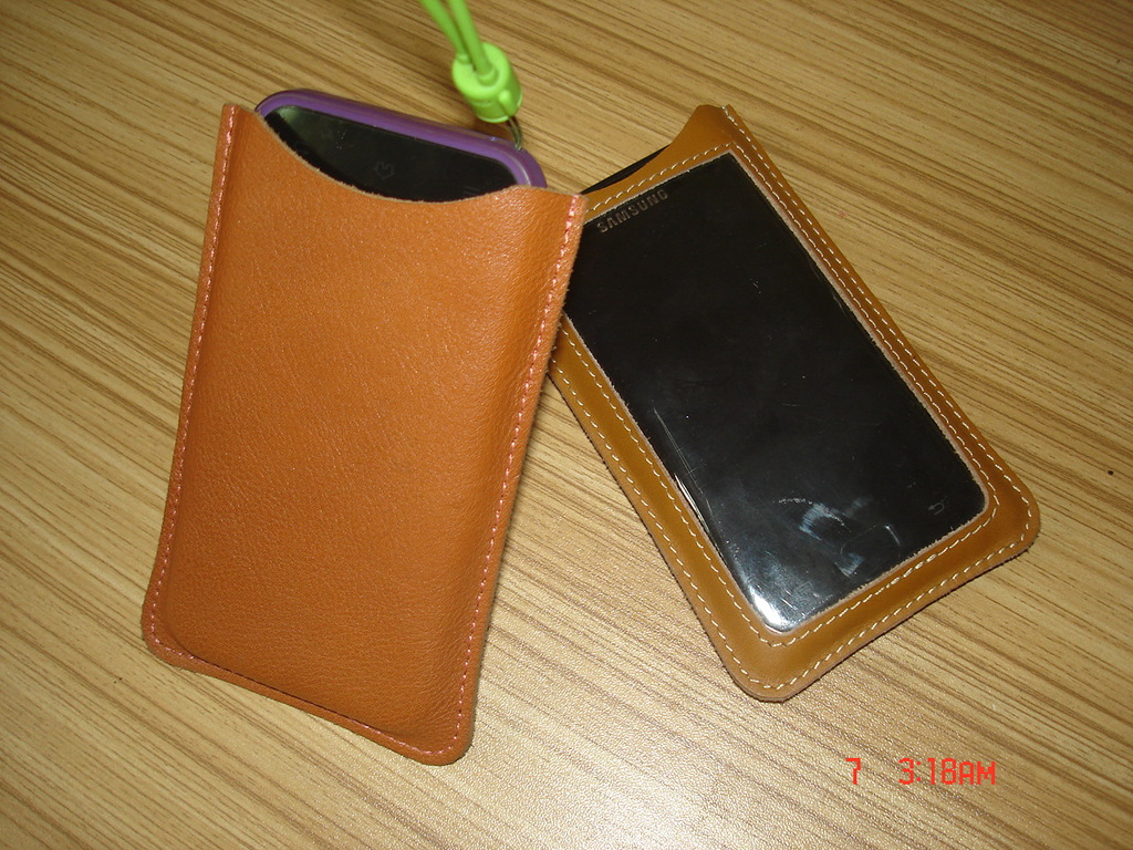 低价供应库存真皮手机套、苹果手机皮套、三星