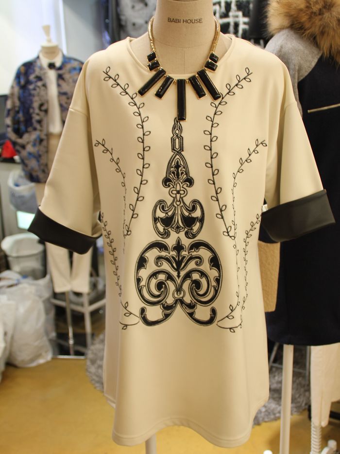 <em>精致女人装</em> 粉红大布娃娃同款 红白格子拼接短