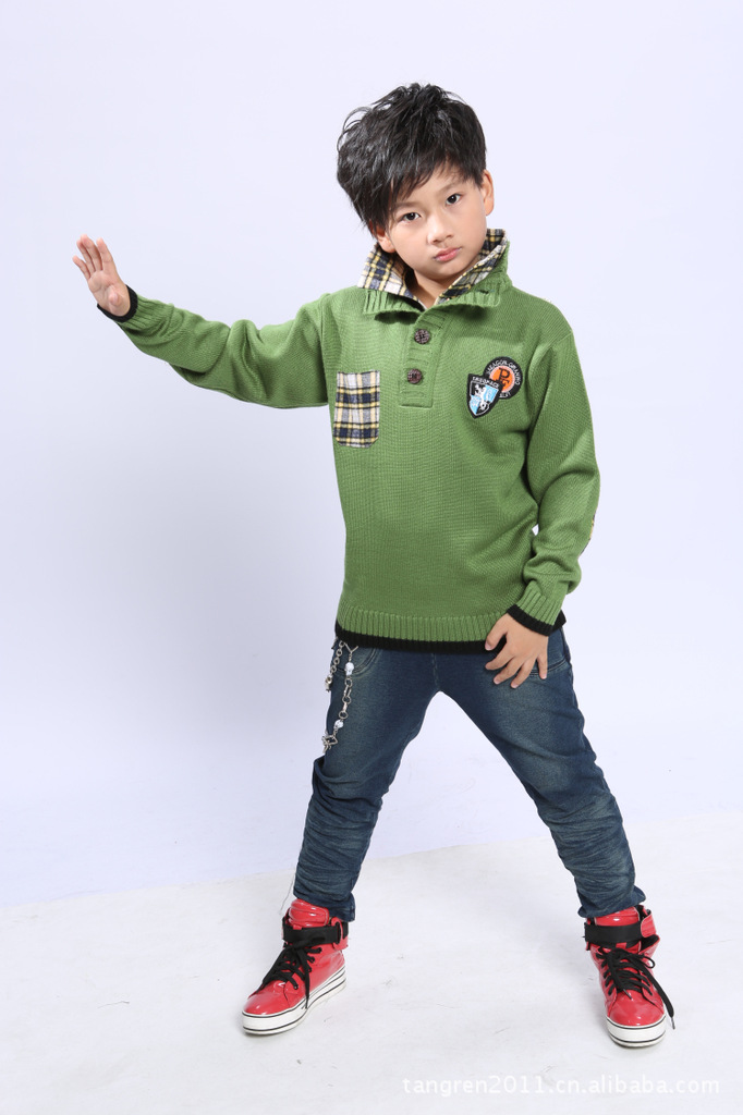 秋冬新款韩款爆版<em>儿童毛衣</em> 钮扣双领中大童针
