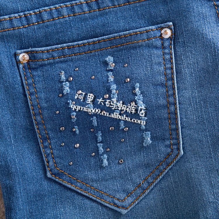 【夏季<em>短裤裙中腰</em>弹力大码短裤镶钻抓破牛仔女