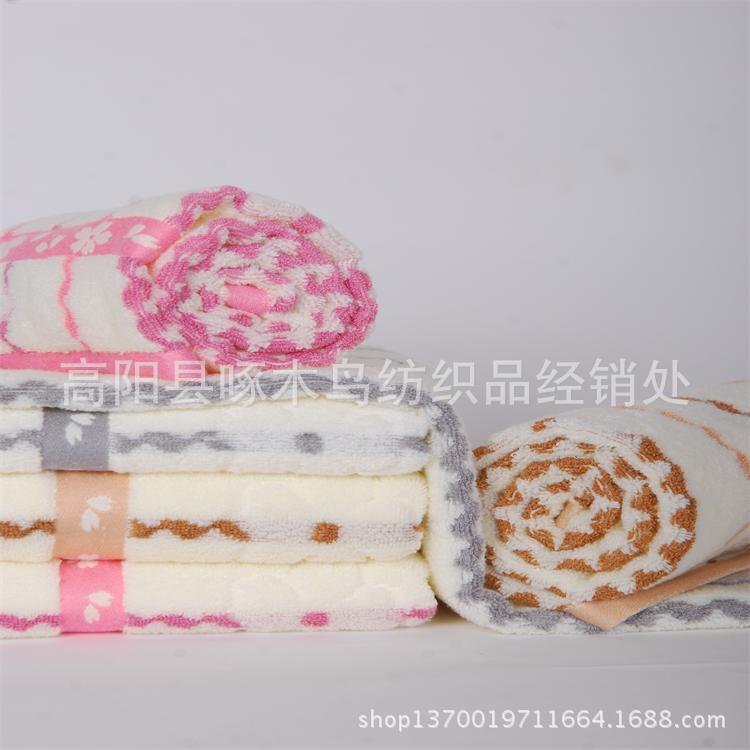 纯棉无捻水纹条梅花毛巾
