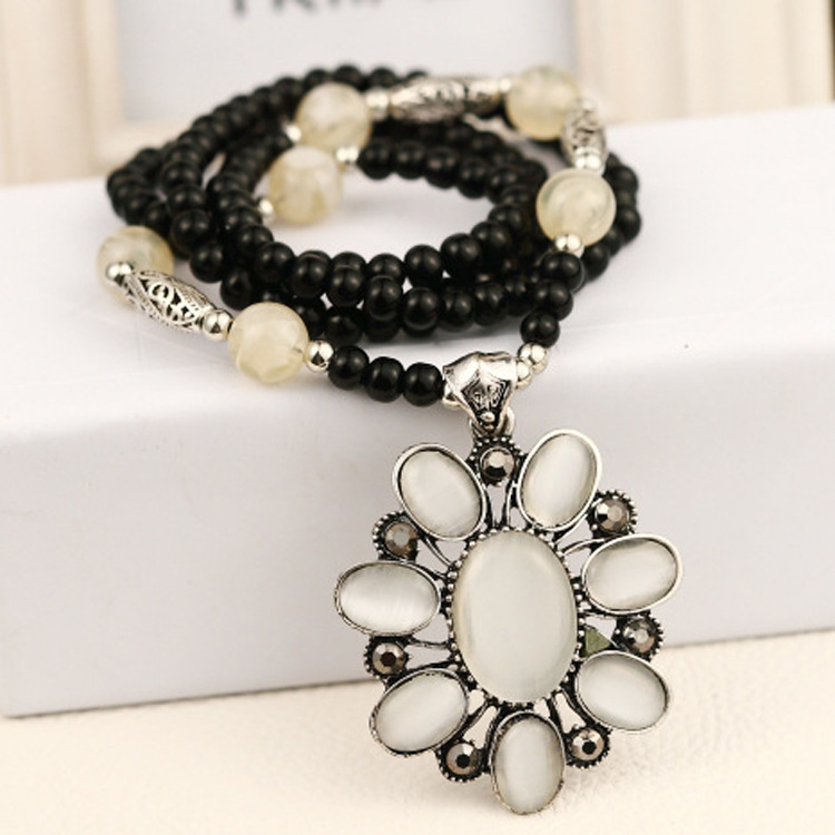 特价<em>爆款</em> 猫眼石花朵佛珠<em>毛衣</em>链 复古<em>时尚长款</em>