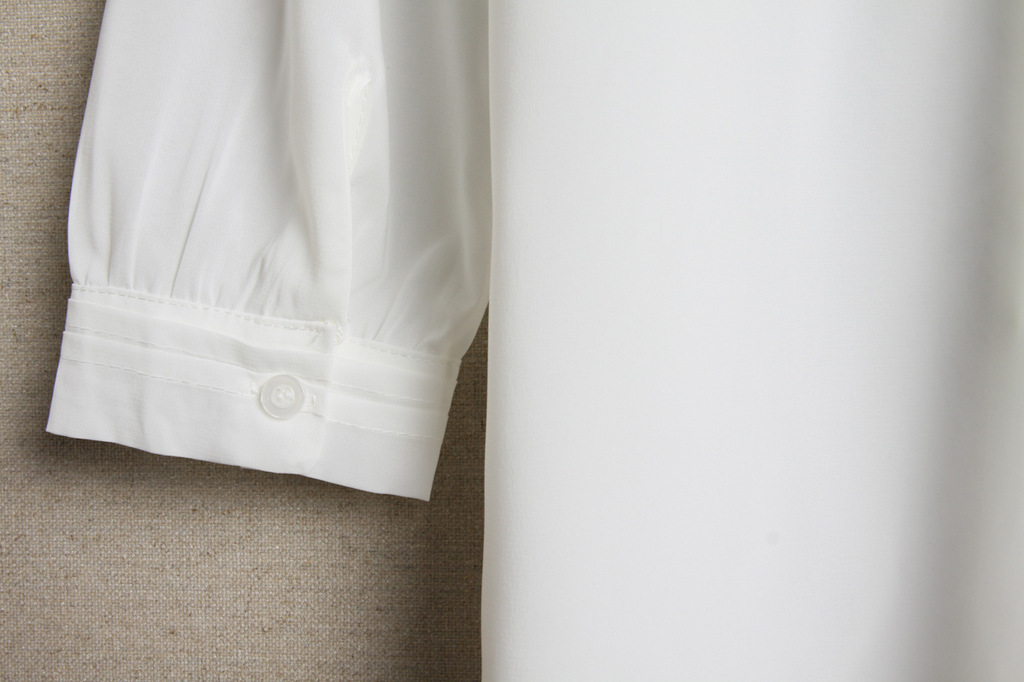 2013春装新款韩版纯色百褶<em>开衫领结</em>翻领学院