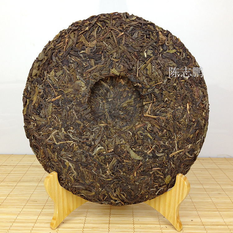 批发供应云南普洱茶 06年中茶黄印生茶 普洱青饼 七子饼 7542配方