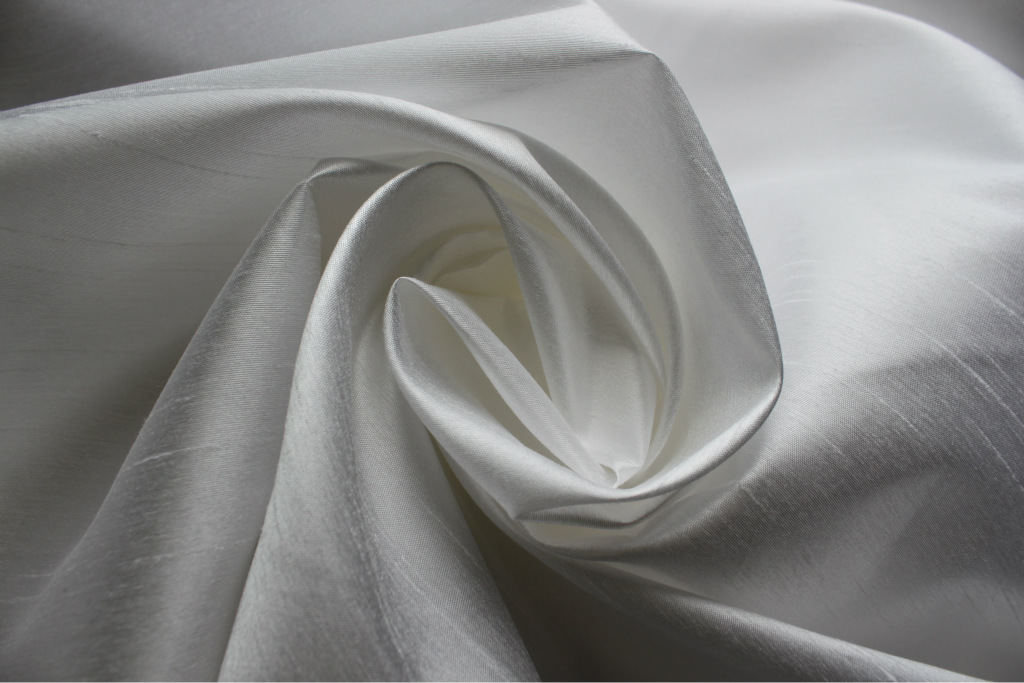 杭州厂家库存纺织品全涤竹节布仿真丝双宫处理面料沙发面料零售