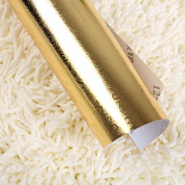 10年厂家供应125克铜板铝箔玖红色压纹纸包装纸批发