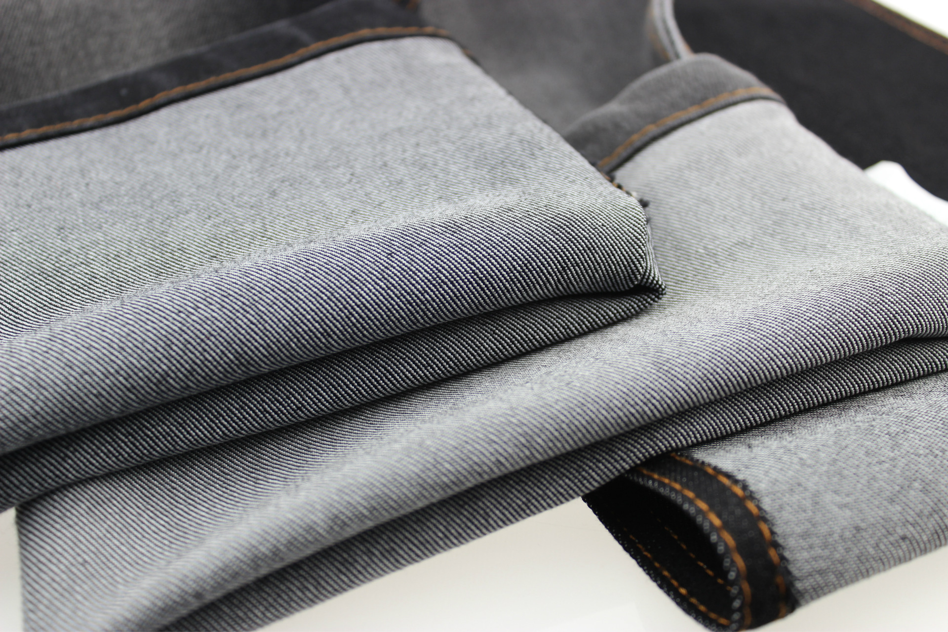 牛仔布面料批发 黑色弹力牛仔布料 厂家直销