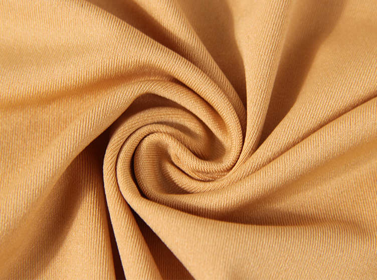 牛奶丝平纹 保暖打底裤布料 活性染磨毛服装布料 可批发_涤纶面料